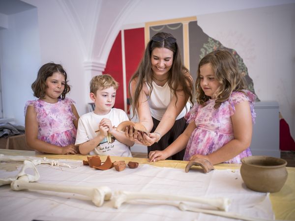 Workshop über Römer mit 3 Kindern