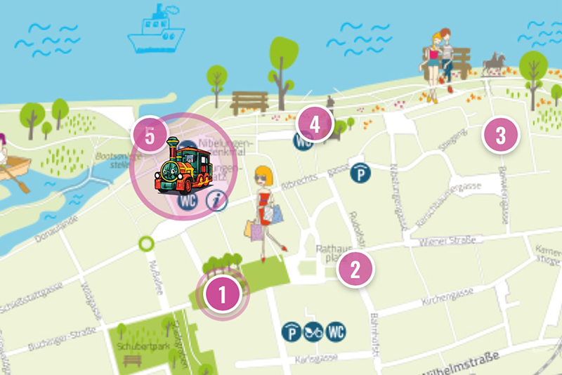 Spielzeuglok mit Nummer 5 auf Stadtplan von Linz, Österreich